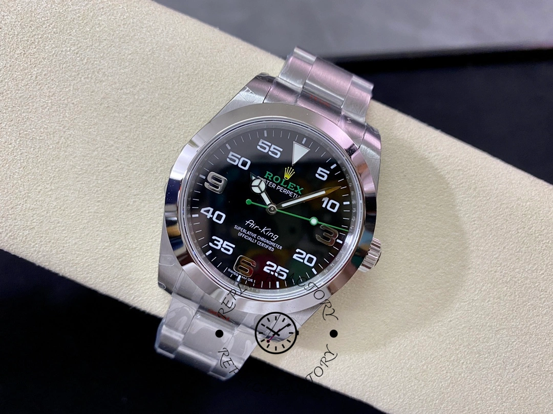 Rolex Air-King 116900, full watch on cushion, angled view with Oyster bracelet.