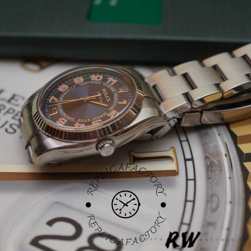 Rolex Air-King 114234, angled view highlighting blue dial and fluted bezel detail.