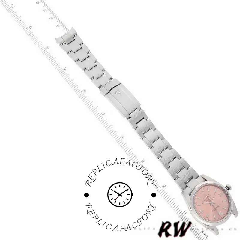 Rolex Air-King 114200 bracelet side view, stainless steel Oyster links with clasp, salmon dial edge.