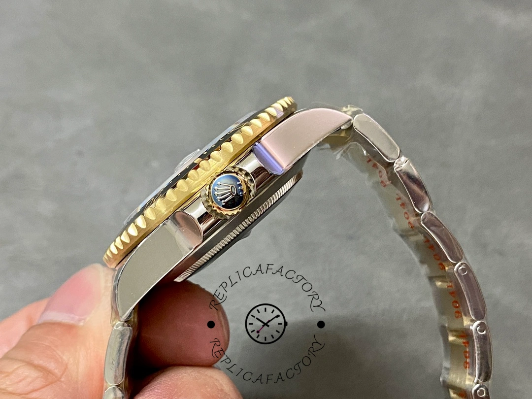 Rolex Sea-Dweller 126603 0001, showing bezel markers and crown.