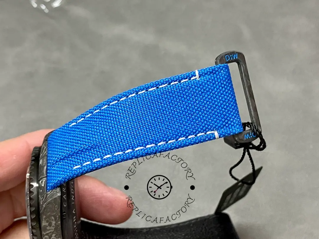 Rolex Sea-Dweller DiW Carbon Fiber, blue strap buckle and clasp close-up.