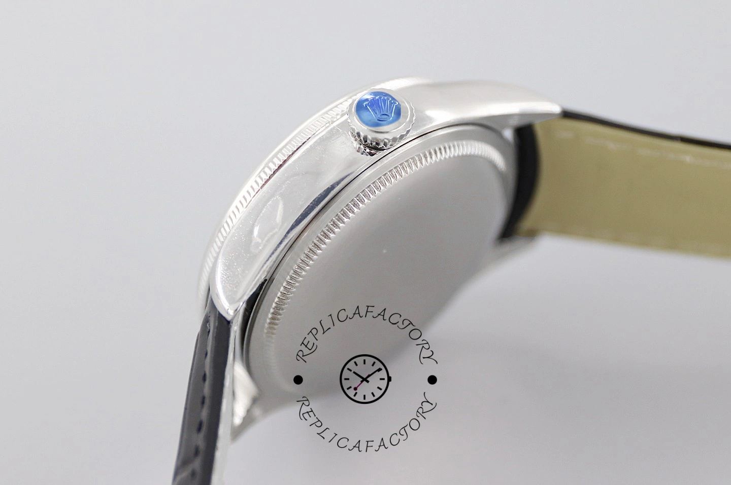 Rolex Cellini Date 50519 case back side view, smooth back and strap attachment, rear angle.