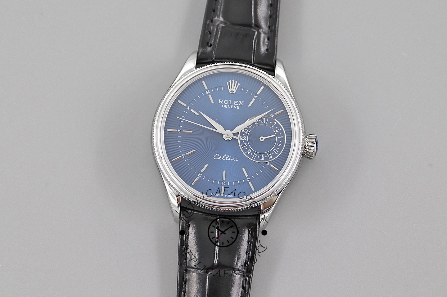 Rolex Cellini Date 50519 studio shot, blue dial on blue leather strap, full watch view.