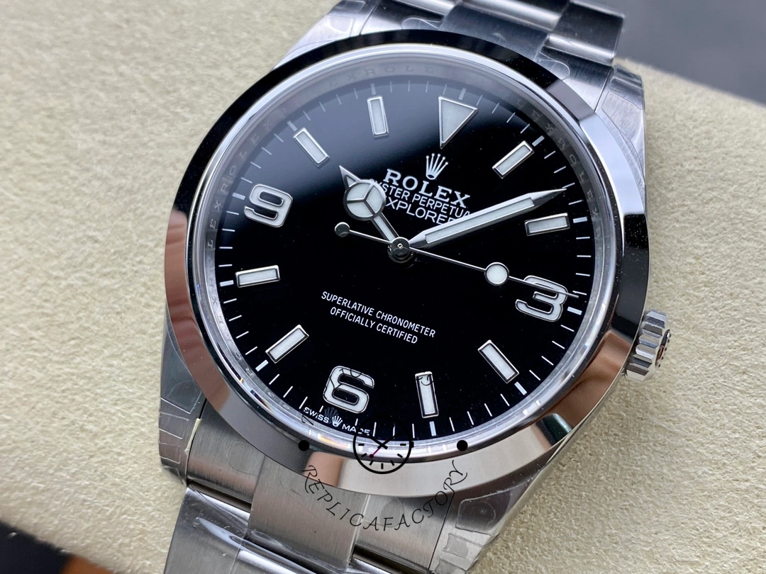 Rolex Explorer 124270 0001, close-up of black dial and Mercedes hands.