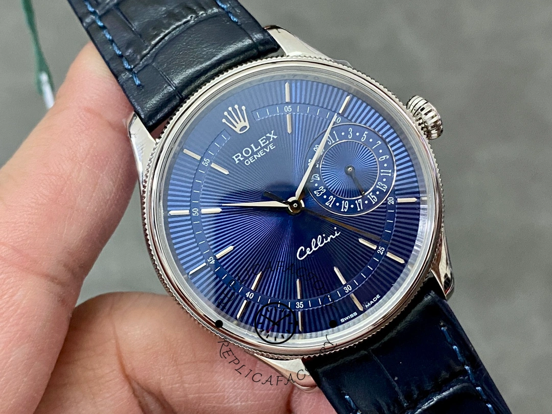 Rolex Cellini Date 50519 close front angle, blue dial details and hands, blue leather strap.