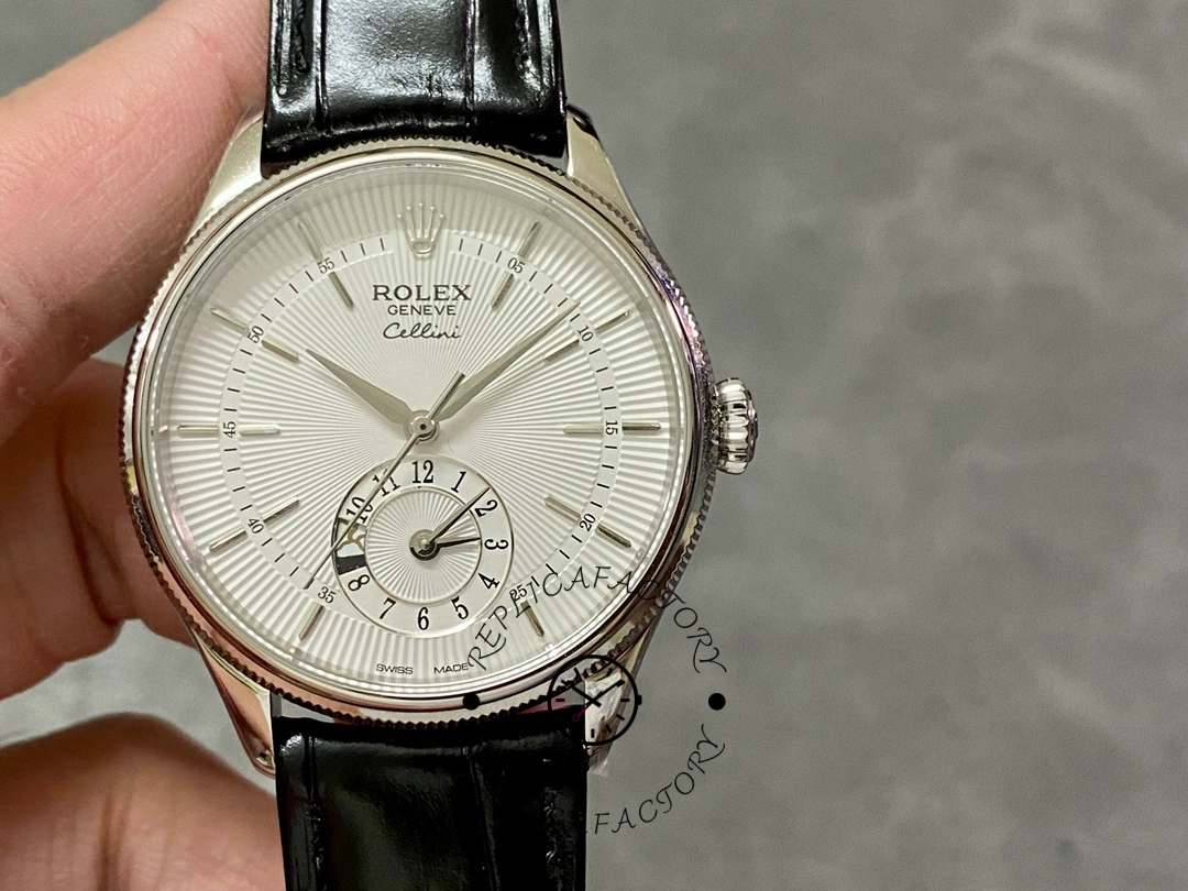 Rolex Cellini Dual Time 50529, hand-held dial close-up showing dual time subdial and sunburst finish.