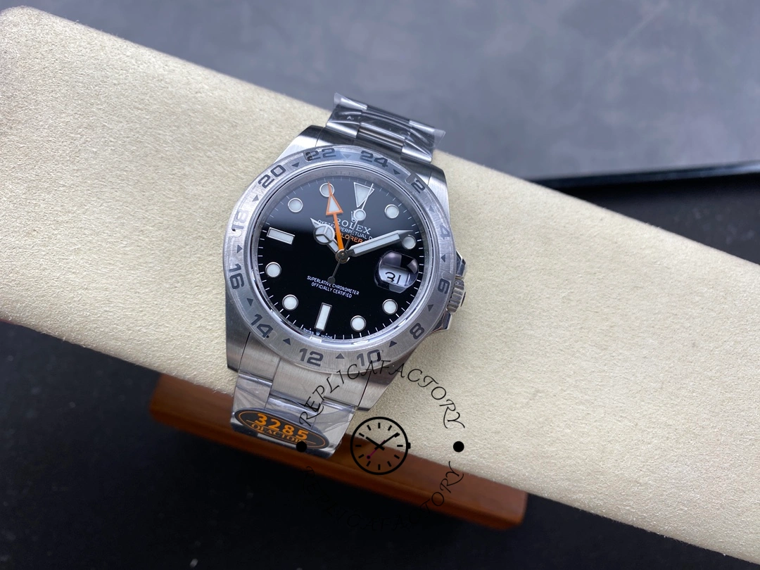 Rolex Explorer II m226570 0002 side view on cushion, black dial, bracelet attached.