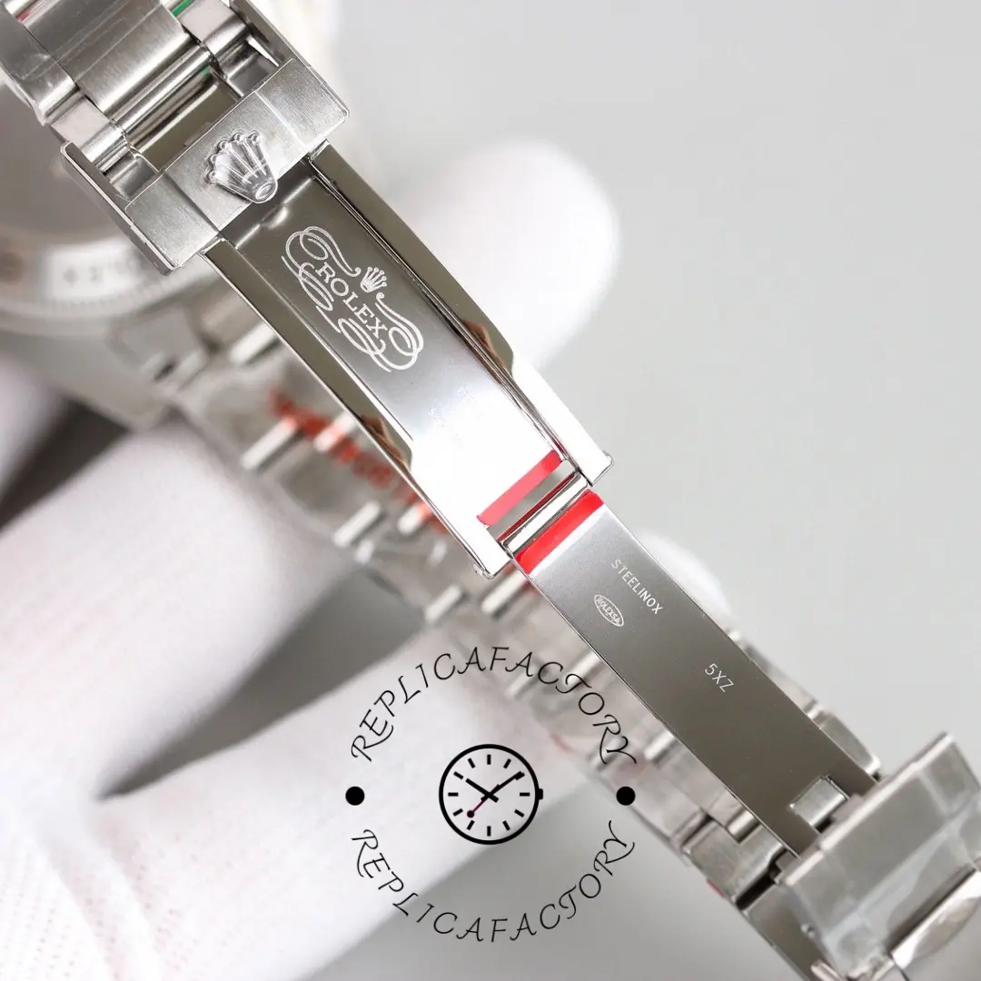 Rolex Deepsea 126660 bracelet side close-up, clasp engraving and link detail, studio shot.