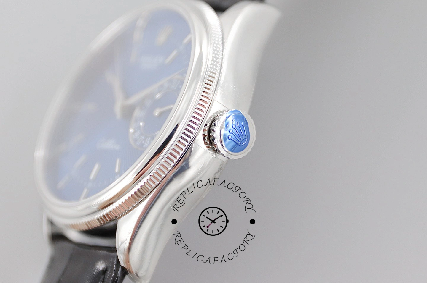 Rolex Cellini Date 50519 crown-side close-up, blue cabochon crown and case profile.