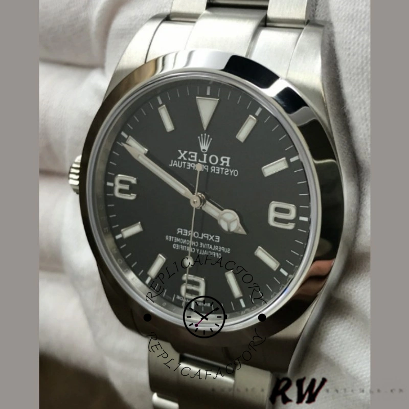 Rolex Explorer 214270 dial close-up, black dial with 3-6-9 numerals, hands detail.