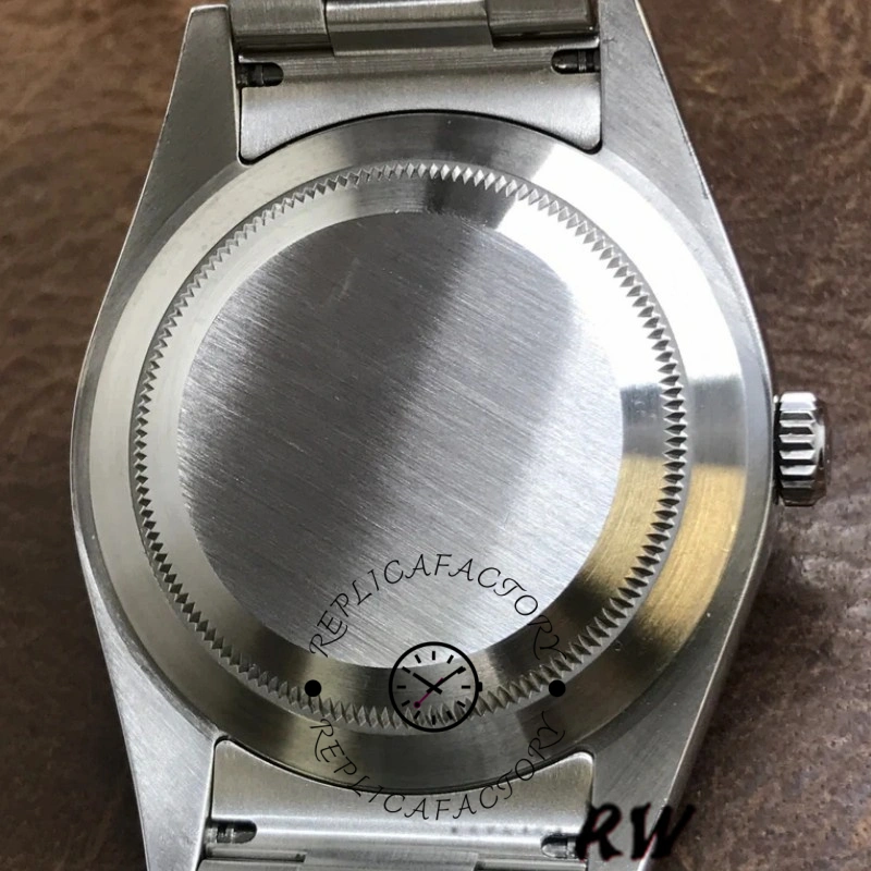 Rolex Explorer 214270 case back close-up, brushed stainless steel back detail.