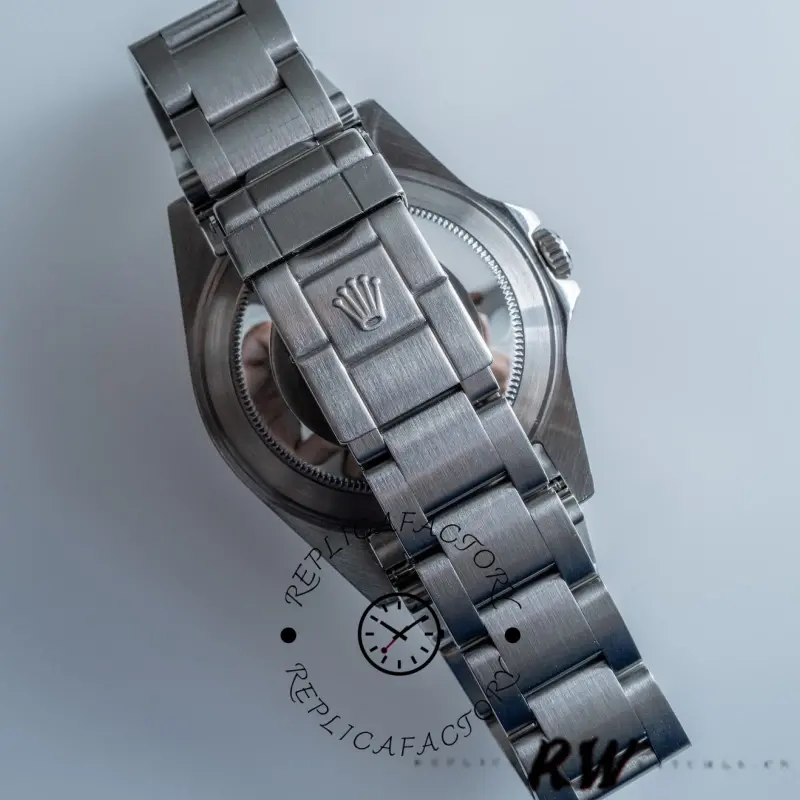 Rolex Explorer II 16570 bracelet and case side view, stainless steel links and clasp detail.