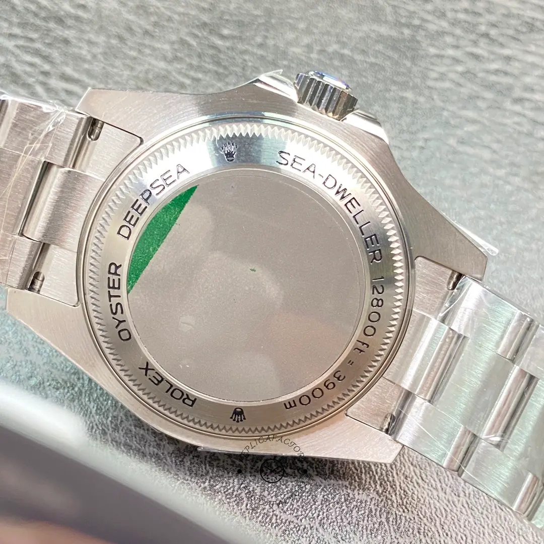 Rolex Sea-Dweller Deepsea 116660, caseback view showing solid back with green sticker.