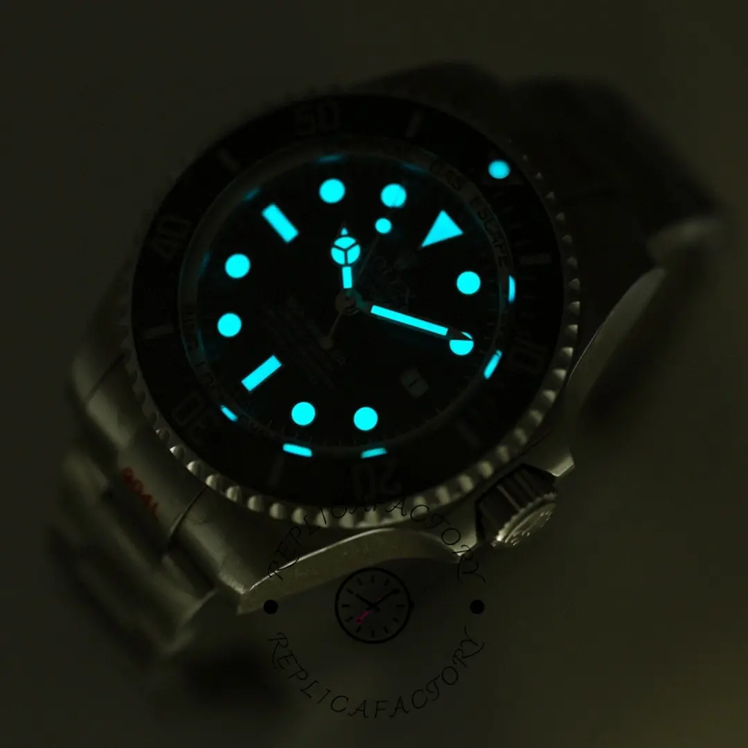 Rolex Deepsea 126660 lume shot, glowing hour markers and hands on black dial.