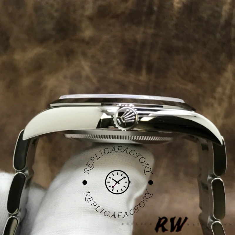Rolex Explorer 214270 case side view, crown and bracelet end links, close-up.