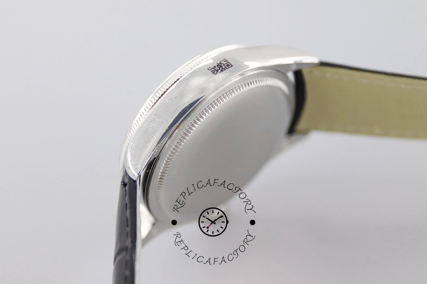 Rolex Cellini Date 50519 rear angle, case back and blue leather strap underside shown.