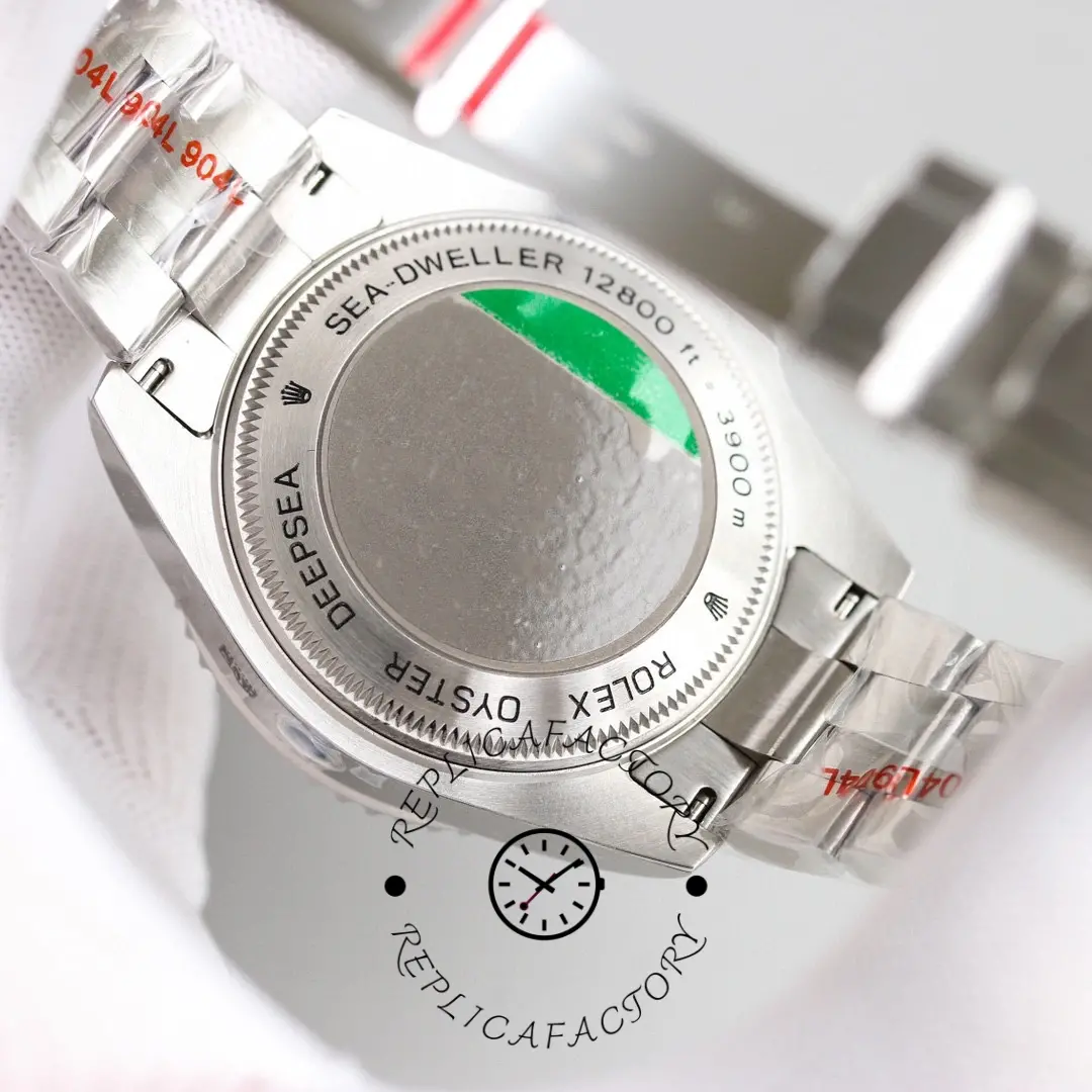 Rolex Deepsea 126660 case back close-up, brushed steel back and bracelet, rear view.