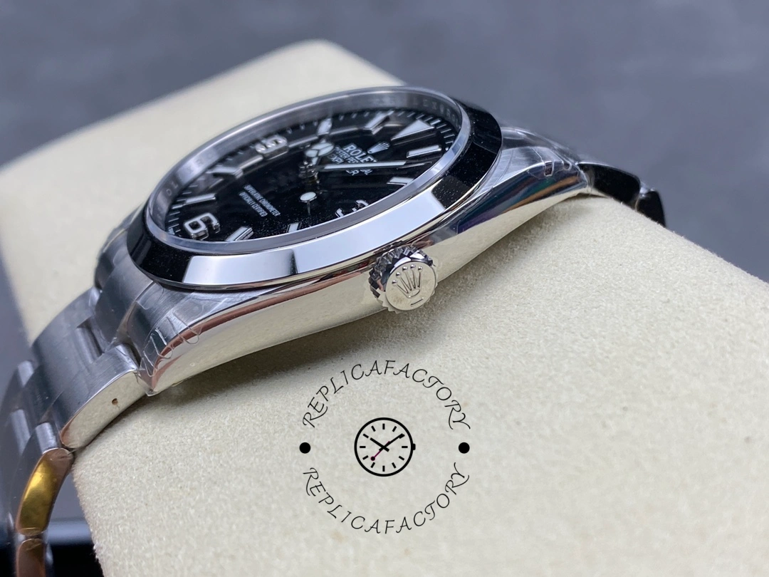 Rolex Explorer 124270 0001, side profile showing crown and bezel edge.