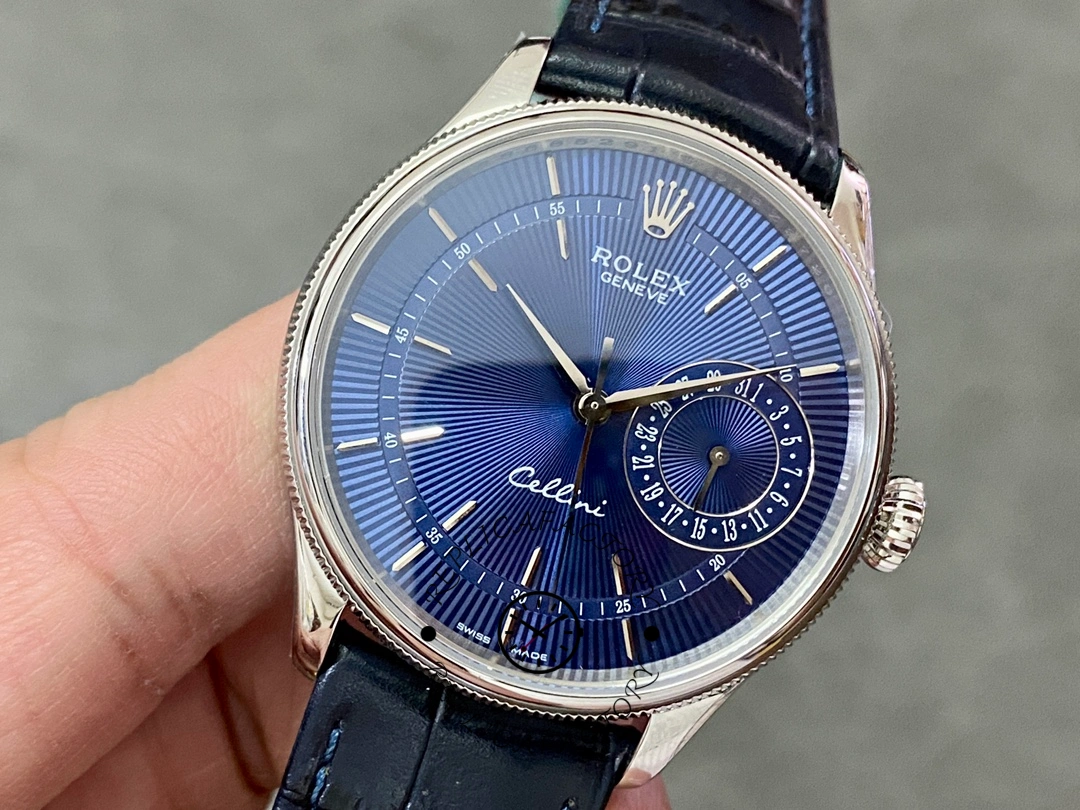 Rolex Cellini Date 50519 angled view, blue dial with date subdial, blue leather strap.