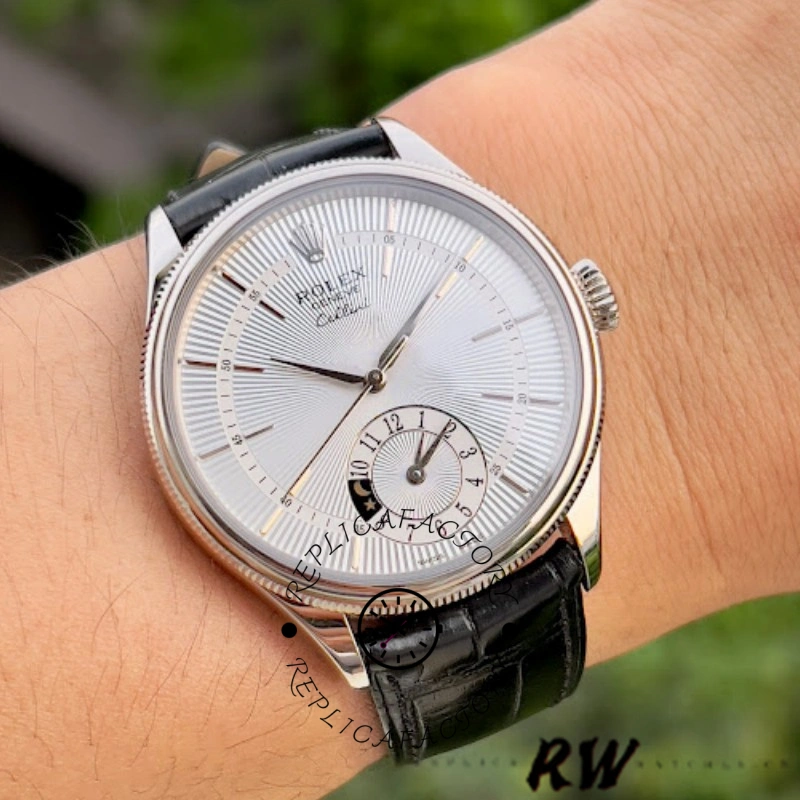 Rolex Cellini Dual Time 50529, wrist shot showing silver sunburst dial and black leather strap.