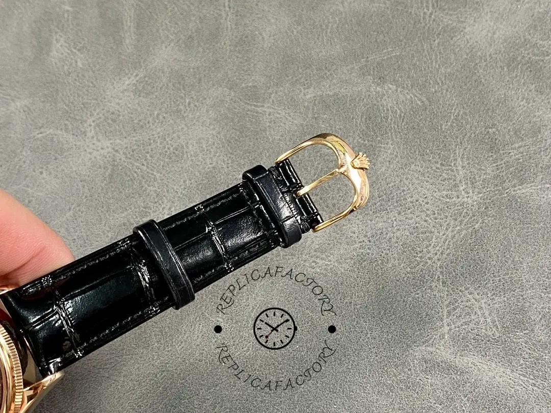 Rolex Cellini Dual Time 50525 clasp view, black leather strap buckle and keeper, rear angle.