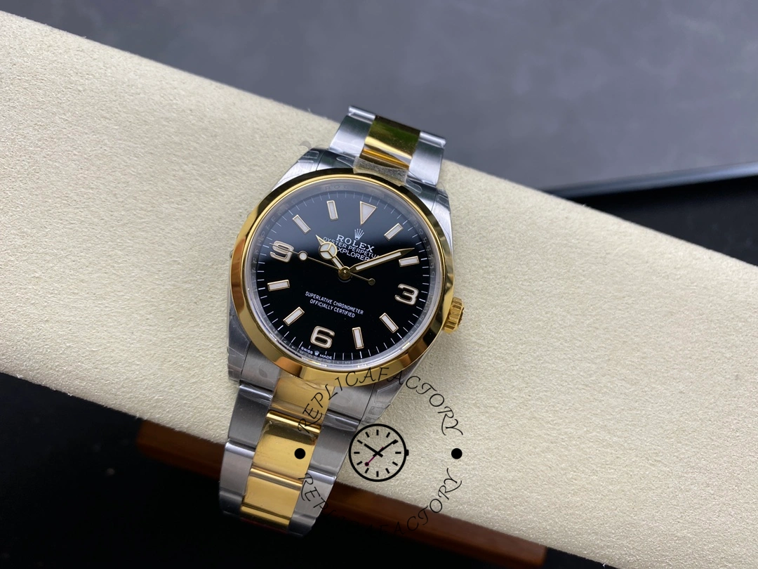 Rolex Explorer M124273-0001, two-tone bracelet and black dial.