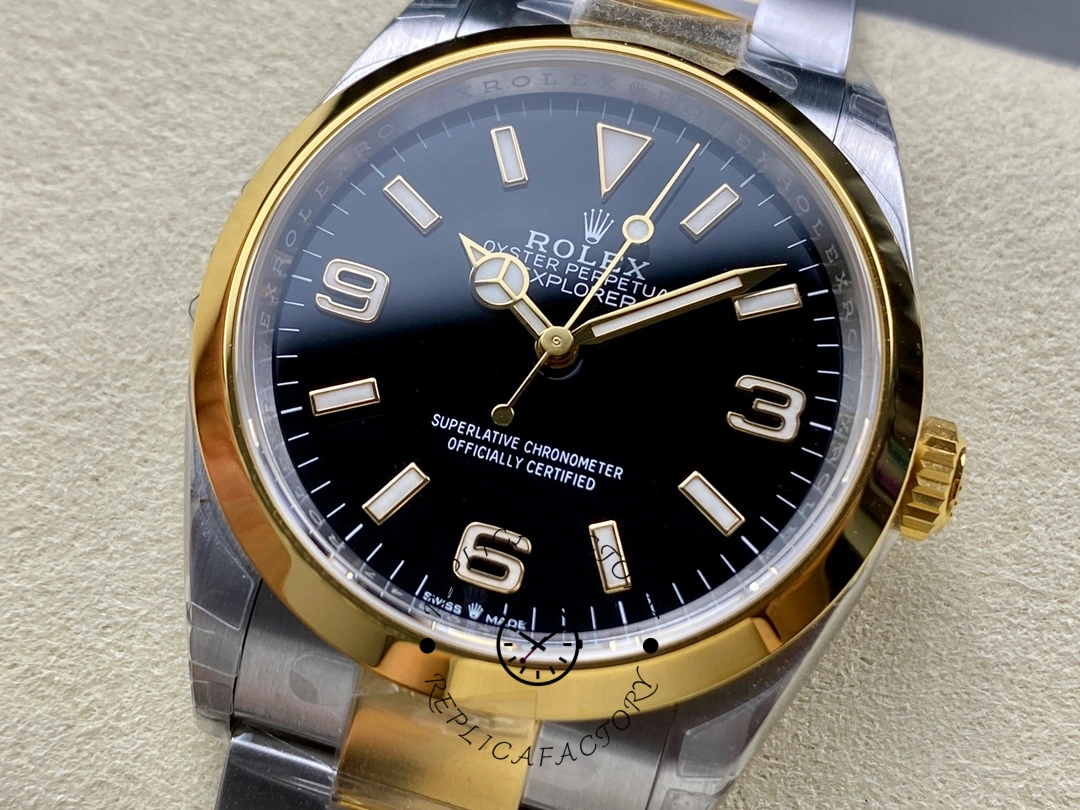 Close-up of Rolex Explorer M124273-0001 black dial, showing 3-6-9 numerals.