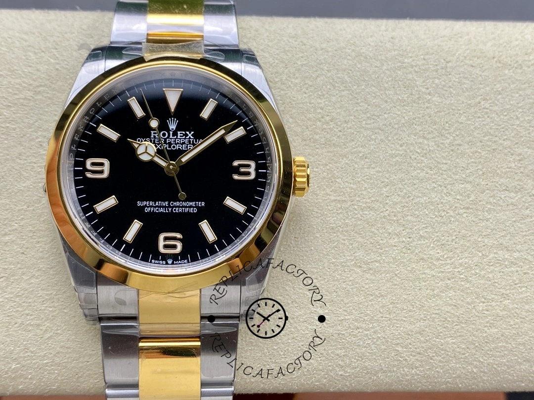 Rolex Explorer M124273-0001 on cushion, showing black dial and 36mm case.