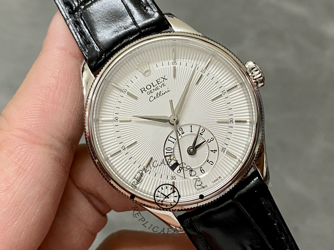 Rolex Cellini Dual Time 50529, close-up of silver dial with applied markers and dual time subdial.
