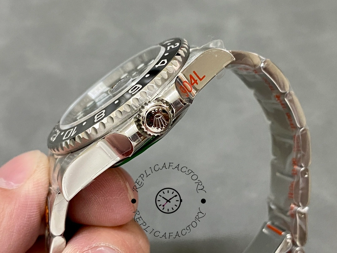 Side case view of Rolex GMT-Master II 116710LN, showing polished case flank and crown.