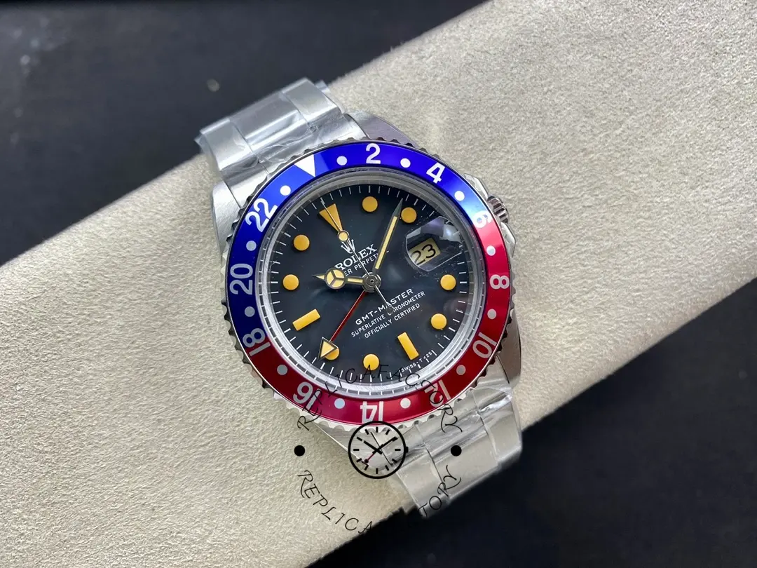 Rolex GMT-Master II 16710, three-quarter view on cushion showing full watch and bracelet.