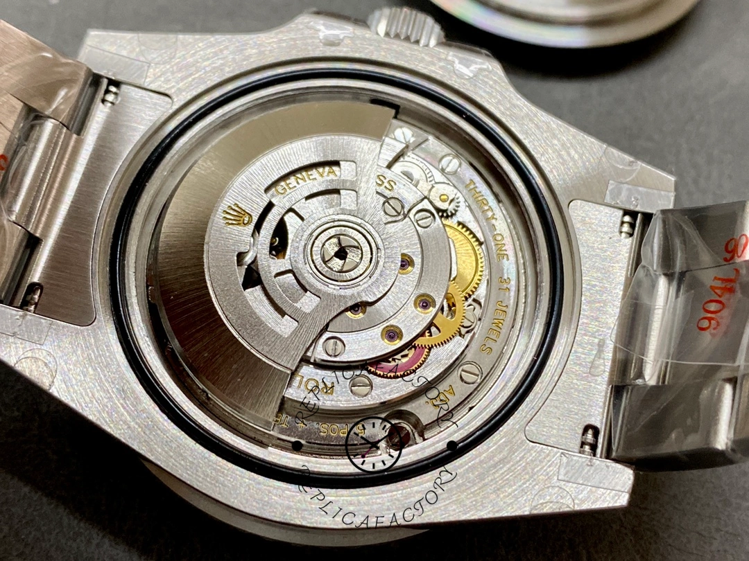 Open movement view of Rolex GMT-Master II 116710LN, showing balance and bridges.