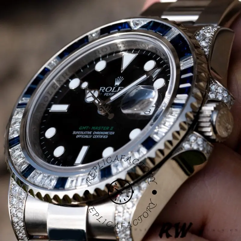 Rolex GMT-Master II 116759SA, dial close-up showing bezel teeth and cyclops date.