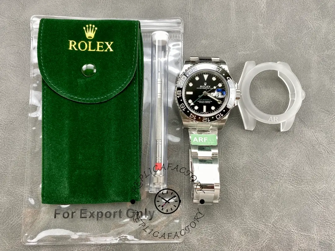 Rolex GMT-Master II 116710LN, set photo with green card holder and watch accessories.