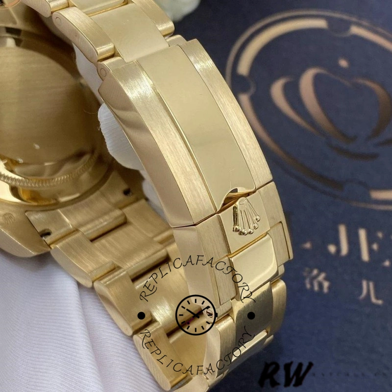 Rolex GMT-Master II 116758, bracelet clasp close-up showing gold links and clasp details.