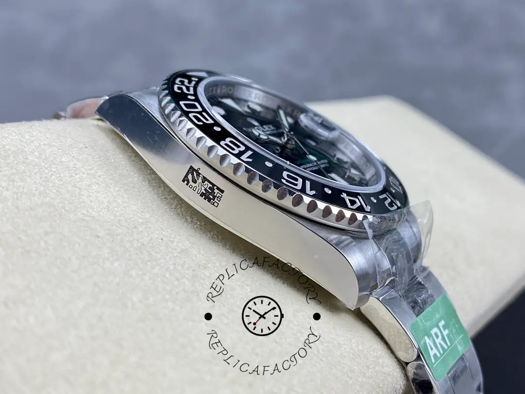 Rolex GMT-Master II 116710LN, side view on cushion showing bezel height and crystal edge.