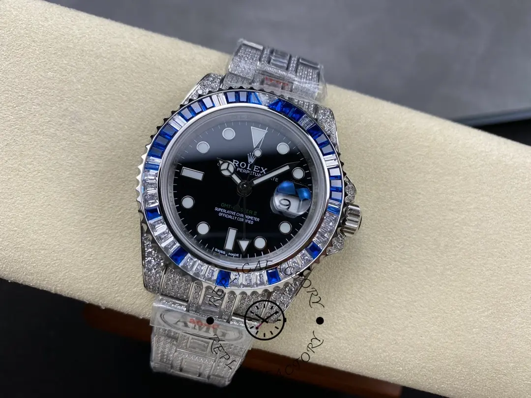 Rolex GMT Master AMG 126710BLRO, top view on cushion showing Pepsi bezel and diamond set.