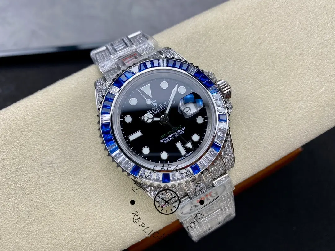 Rolex GMT Master AMG 126710BLRO, full watch on cushion showing diamond bracelet and bezel.