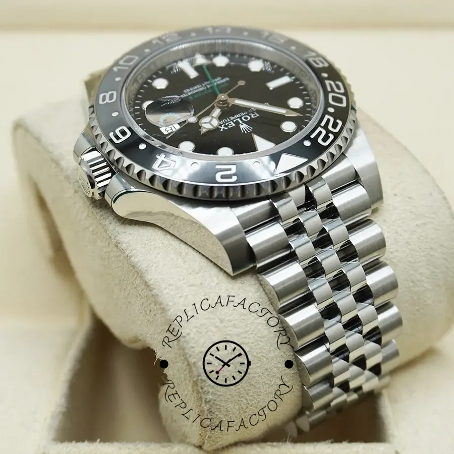 Rolex GMT-Master II M126710GRNR 0003, close-up showing bezel numbers and polished case.