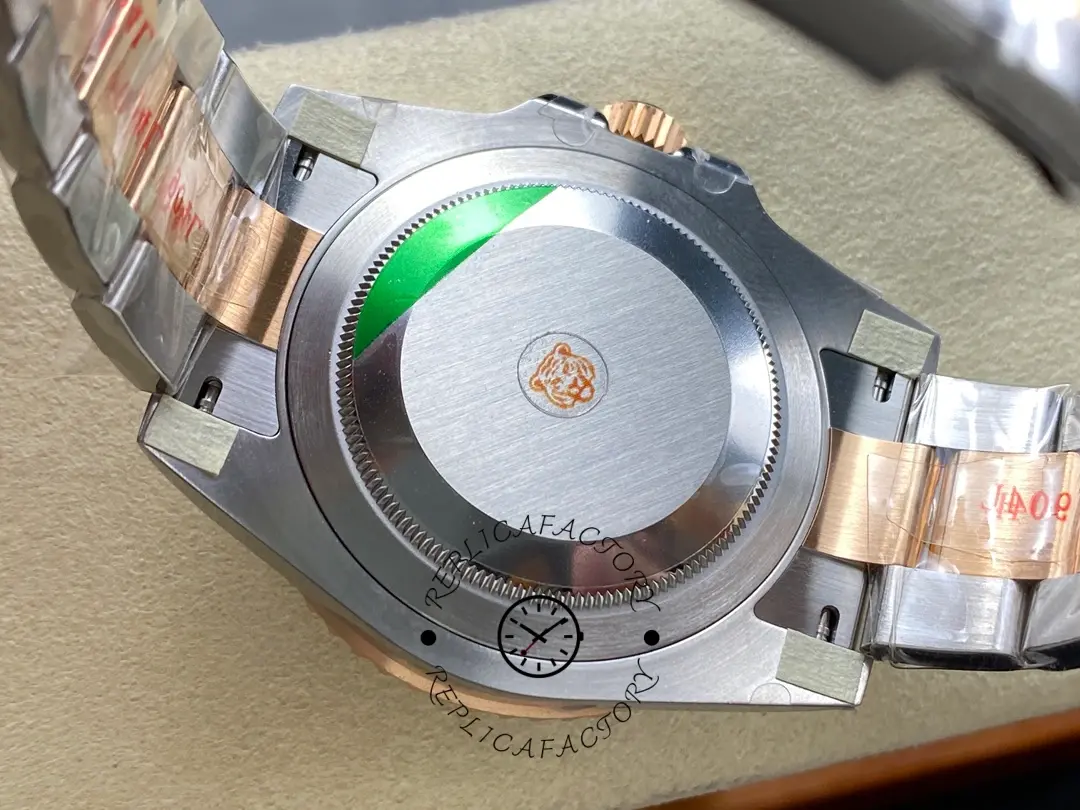 Caseback close-up of Rolex GMT-Master II 126711CHNR, showing protective sticker and back.