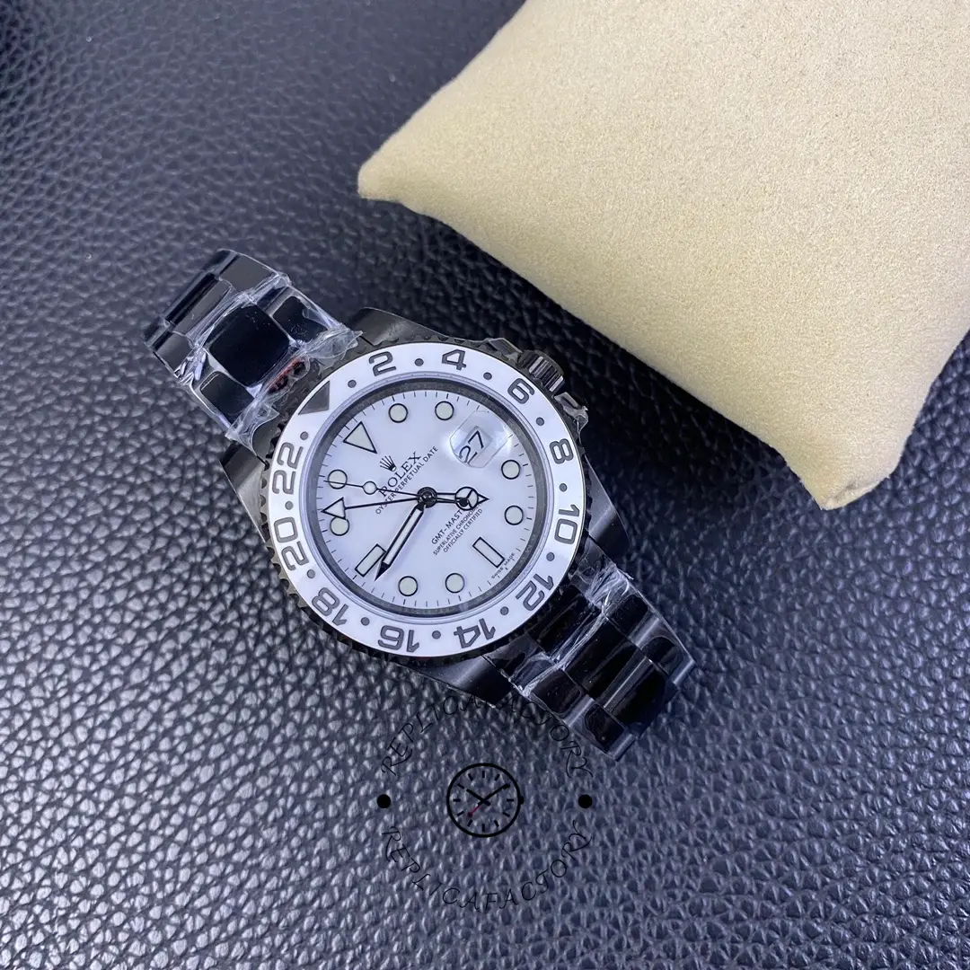 Rolex GMT-Master II 16710, white dial, black PVD/DLC bracelet.