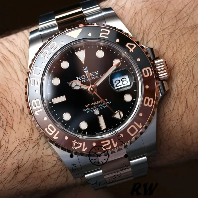 Wrist shot of Rolex GMT-Master II 126711CHNR, black dial with GMT hand visible.