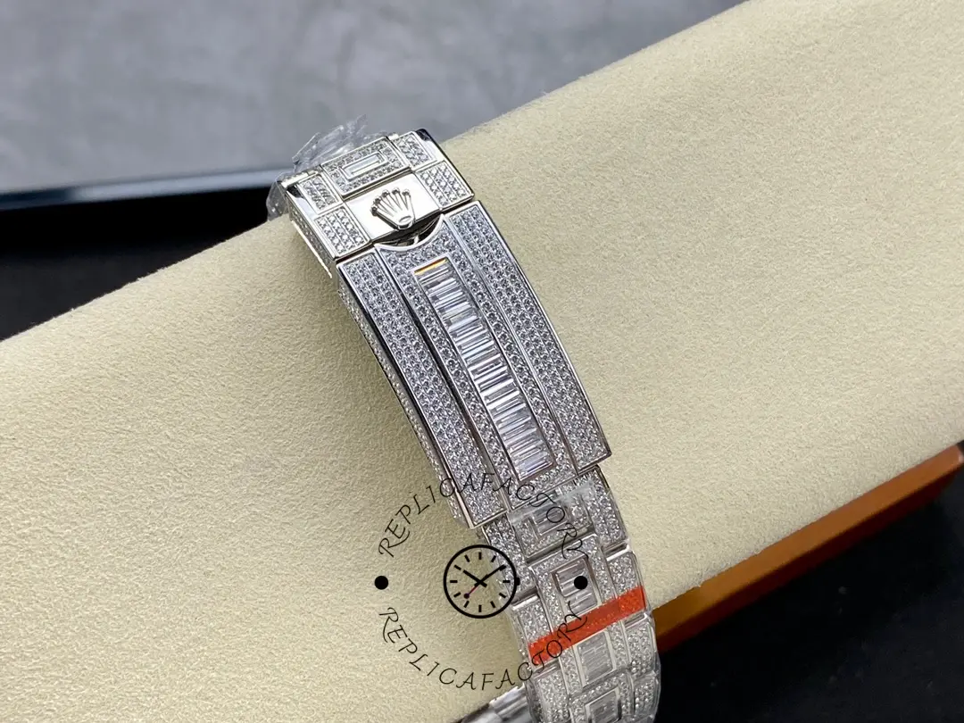 Rolex GMT Master AMG 126710BLRO, bracelet clasp view on cushion showing clasp and links.