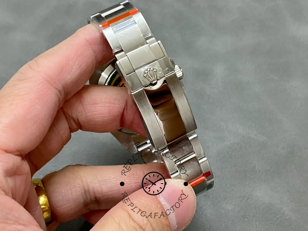 Bracelet and clasp open view of the Rolex GMT-Master II 126710BLRO 0002 showing clasp structure.