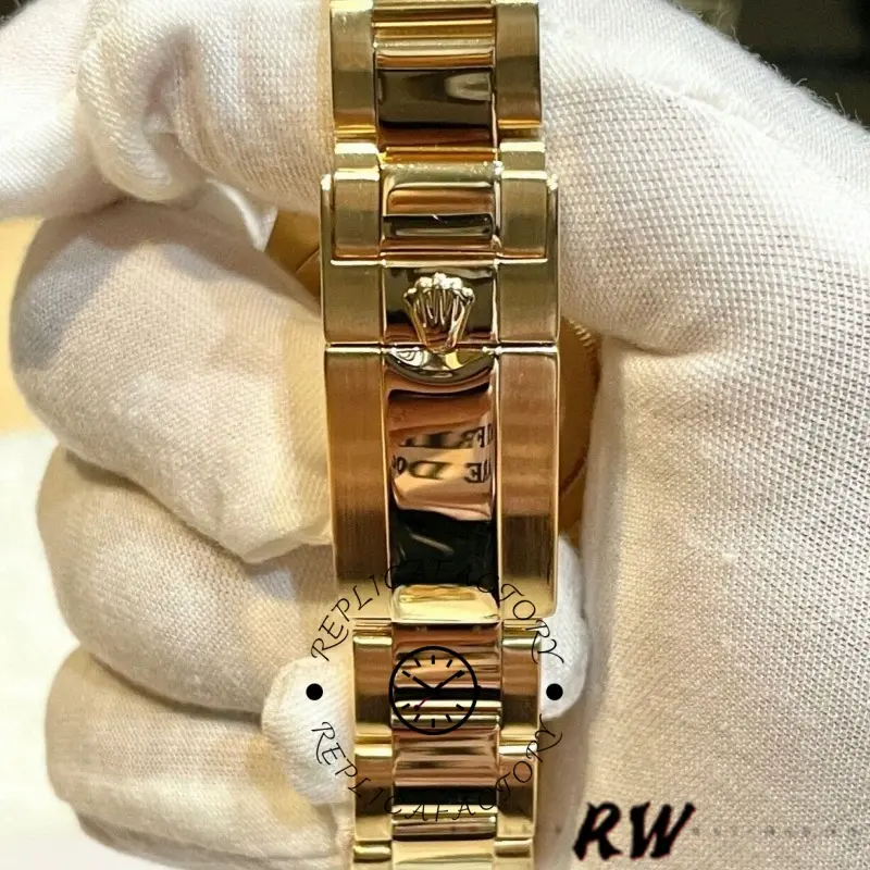 Rolex GMT-Master II 116718LN, bracelet underside view held in glove showing clasp area.