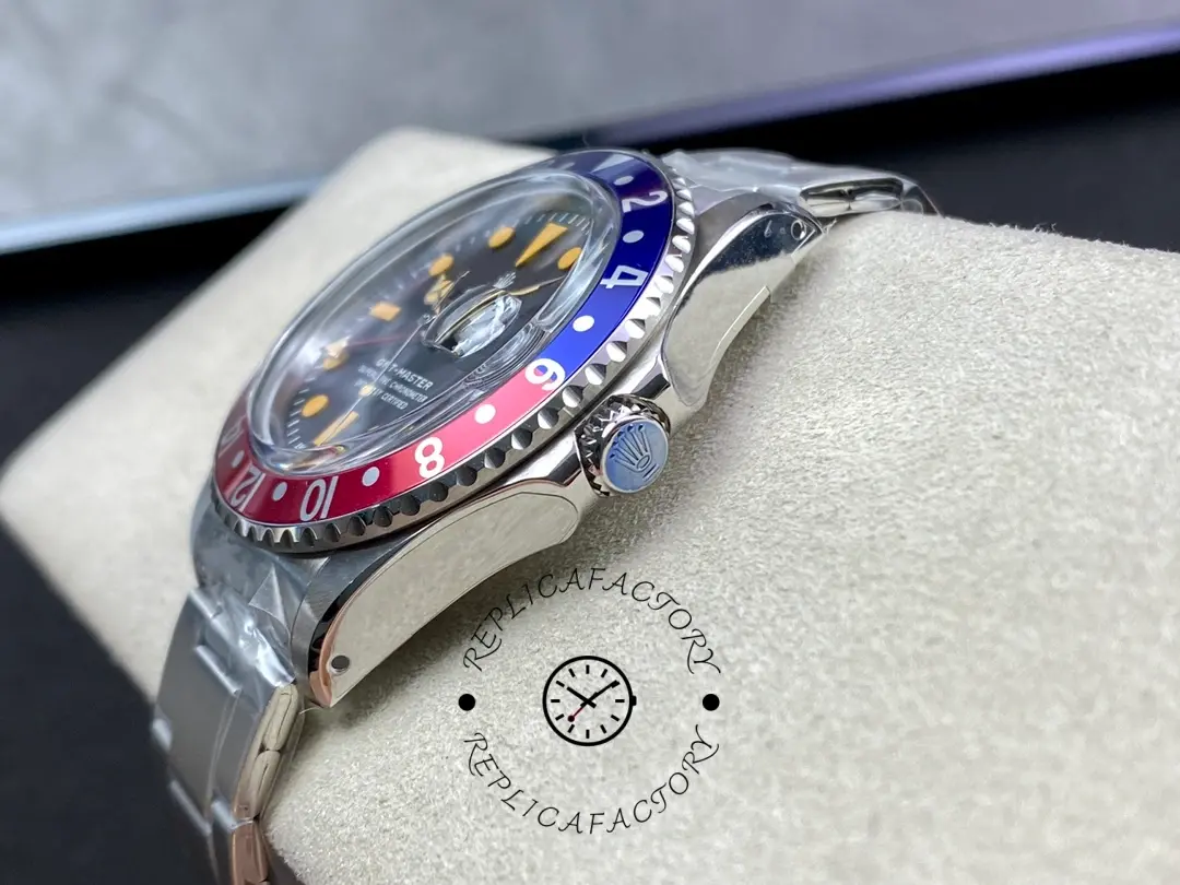 Rolex GMT-Master II 16710, angled side view on cushion showing lugs and bracelet fit.