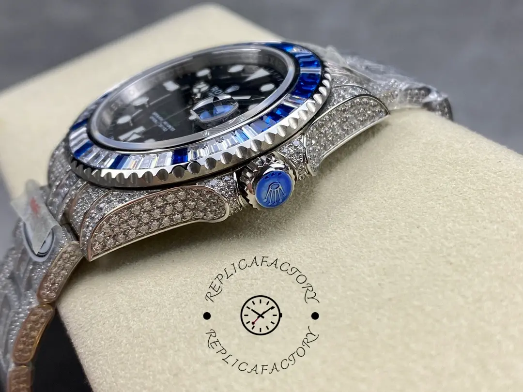 Rolex GMT Master AMG 126710BLRO, side view showing crown guards and diamond case profile.