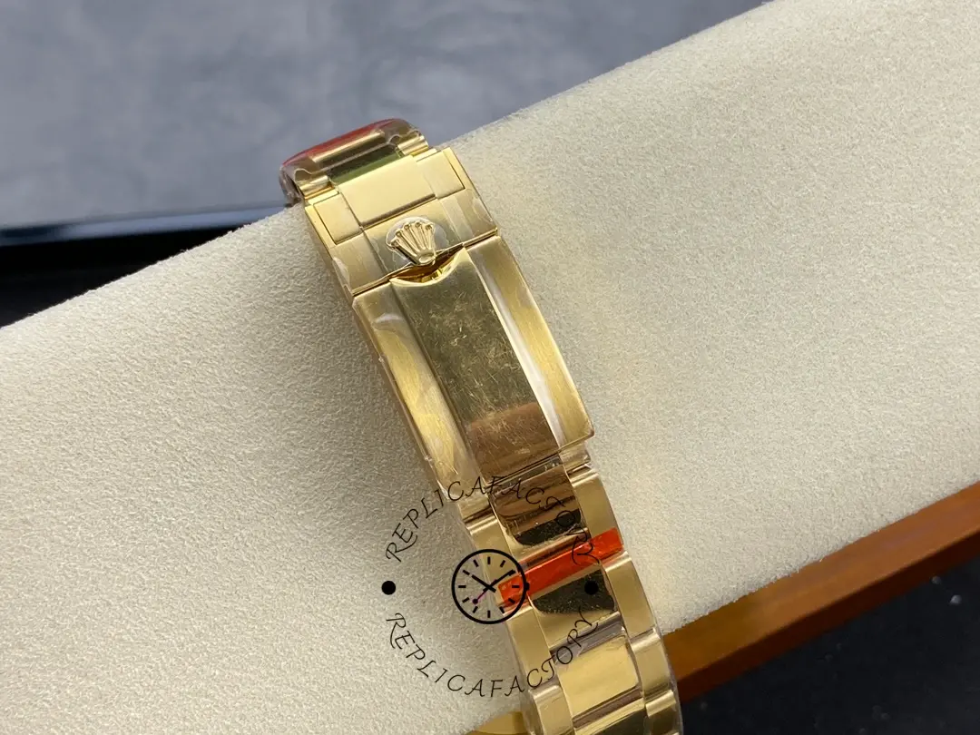 Bracelet close-up of Rolex GMT-Master II 116718LN showing 18k yellow gold links and finish.