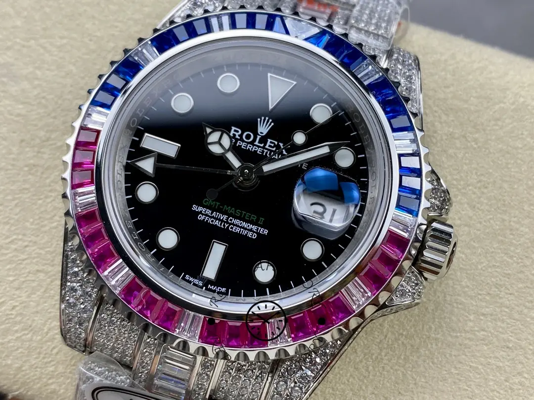 Angled front view of the Rolex GMT Master AMG 126710BLRO on cushion, diamond bezel visible.