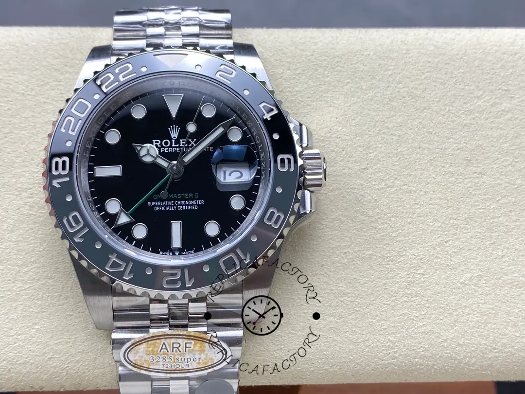 Rolex GMT-Master II M126710GRNR 0003, front view on cushion showing bezel and dial.